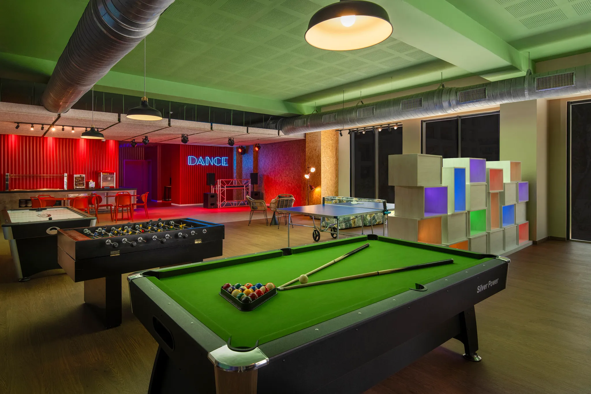 Entertainment lounge with billiards, foosball, and games at Dreams Playa Esmeralda Resort & Spa.