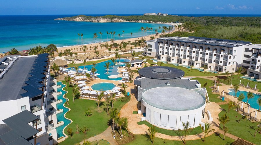 Dreams Macao Beach Punta Cana all-inclusive beachfront resort with family-friendly pools and modern tropical design.