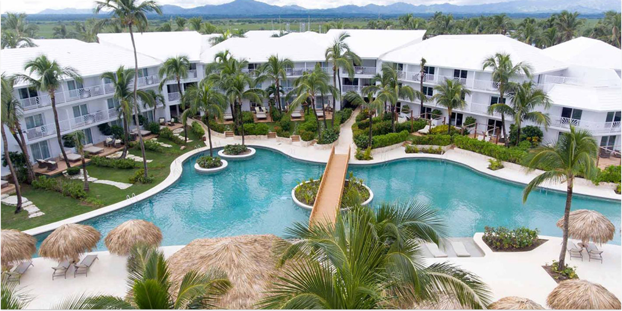 Excellence Punta Cana adults-only all-inclusive beachfront resort with lagoon-style pools and luxury suites.