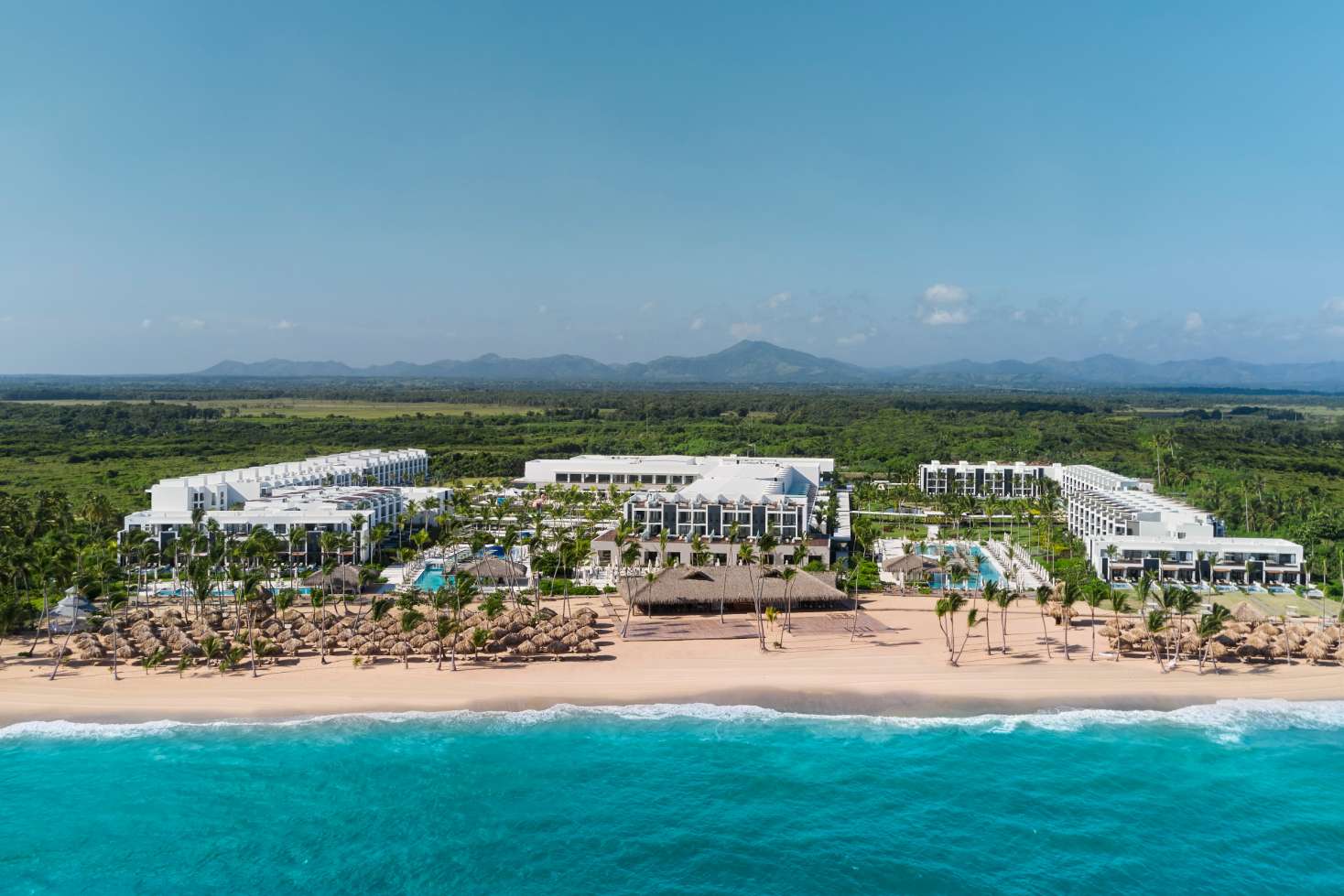 Finest Punta Cana luxury beachfront all-inclusive resort with modern pools and upscale accommodations.