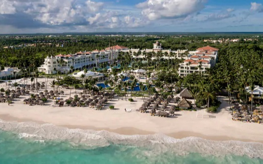 Iberostar Grand Bavaro adults-only beachfront luxury resort with elegant pools and tropical landscaping in Punta Cana.