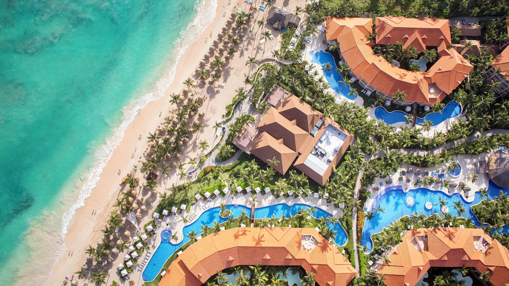 Majestic Elegance Punta Cana all-inclusive beachfront resort with elegant suites and tropical pool areas.