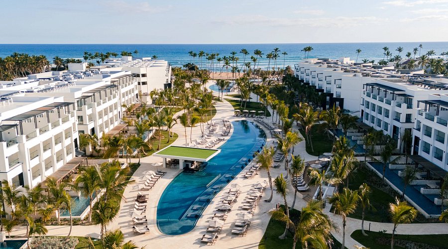 Secrets Tides Punta Cana adults-only luxury beachfront resort with elegant pools and tropical oceanfront views.